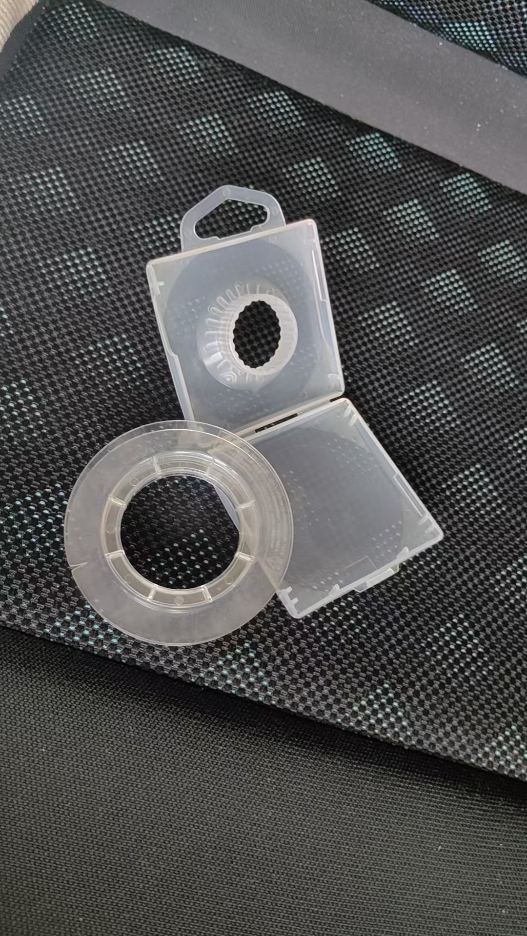 Clear plastic fishing line spool and package sample